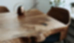 natural wood slab as wood dining table promoting biophilic design and creating relaxing vibe